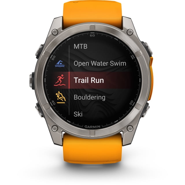 garmin, monitor deportivo, fenix 8, 51mm, amoled,sapphire, orange reloj inteligente multideporte 51 mm con caja metálica plateada y bisel atornillado. Pantalla AMOLED muestra modos deportivos con "Trail Run" resaltado; correa de silicón naranja, cinco botones laterales, vista frontal centrada sobre fondo blanco. También suele usarse para seguimiento de rutas y entrenamiento al aire libre.