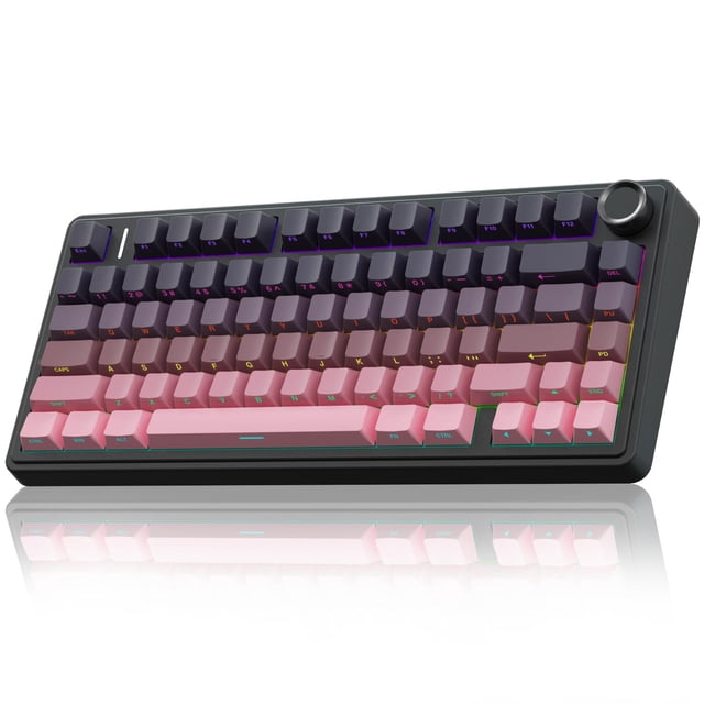 teclado mecánico inalámbrico aula f75 pro 75% rgb rosa y negro teclado compacto 75% (81 teclas) vista 3/4 frontal con perilla superior derecha, keycaps PBT rosa en filas inferiores y negras en superiores, iluminación RGB visible entre teclas, carcasa plástica oscura con acabado mate, conexiones BT5.0/2.4GHz/USB-C soportadas; suele usarse también como teclado compacto para escritorios y estaciones de trabajo pequeñas.