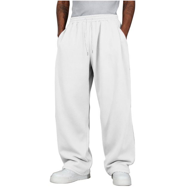amzcrzy pantalones deportivos hombre clásicos color liso cintura alta elástica cordón pierna recta holgados anchos cómodos con bolsillos tallas s-2xl blanco Vista frontal de pantalones deportivos blancos Amzcrzy en poliéster con cintura alta elástica y cordón visible, piernas rectas y holgadas hasta el tobillo, bolsillos laterales prácticos; talla M ejemplo cintura 80 cm. Su tamaño y corte los hacen adecuados para uso informal y entrenamiento ligero.