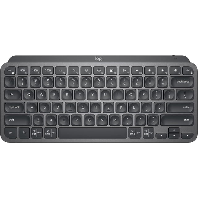 logitech mx keys mini teclado minimalista inalámbrico iluminado compacto, bluetooth, retroiluminado, usb-c, compatible con apple macos, ios, windows, linux, android, metal build - grafito Teclado compacto en vista cenital con carcasa grafito y acabado metálico; teclas de perfil bajo y bordes redondeados. Se distingue la fila de funciones y teclas multimedia, tecla dedicada de dictado, tecla de emoji y tecla de silencio; retroiluminación en las teclas. Apto para estaciones de trabajo compactas o viajes por su tamaño reducido.