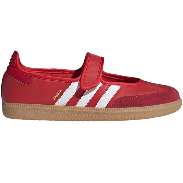 tenis zapatillas para dama adidas samba jane red Tenis adidas Samba Jane para dama en rojo, vista lateral izquierda centrada; parte superior de cuero y ante, cierre de velcro ancho, tres franjas blancas y texto dorado "Samba" en el costado, suela de goma color caramelo. Las tiras de velcro facilitan ponerlos y quitarlos y los hacen adecuados para uso diario y relajarte en casa.
