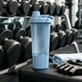 thumbnail image 1 of Botella de agua deportiva con vaso mezclador para batidos de proteínas | Botella mezcladora portátil con agitador y compartimento de almacenamiento integrados, 1 of 7