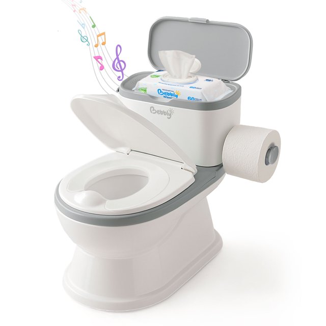 bebbly bañito entrenador infantil con sonido musical portarrollo y almacenamiento asiento antiderrapante para niños y niñas de 6 meses a 3 años fácil de limpiar ideal para aprender a ir al baño (gris) — Vista frontal 3/4 del entrenador tipo inodoro en gris y blanco; asiento ergonómico con tapa abierta, base estable con borde antiderrapante, portarrollo lateral con rollo y compartimento superior con tapa para toallitas. Se aprecia la bandeja interior extraíble para vaciado y el botón musical indicado por icono de notas. Adecuado como apoyo didáctico para el entrenamiento del baño.