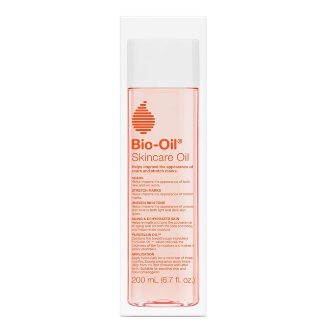 aceite para el cuidado de la piel bio-oil 6.7oz multiuso envase transparente cilíndrico frontal con líquido ámbar claro y etiqueta naranja que muestra marca Bio-Oil y texto sobre mejora de cicatrices, estrías y tono desigual; tapa blanca, fondo blanco, incluye ingredientes listados como vitaminas A y E, caléndula, lavanda y manzanilla; usado por embarazadas y para hidratación y masaje corporal.