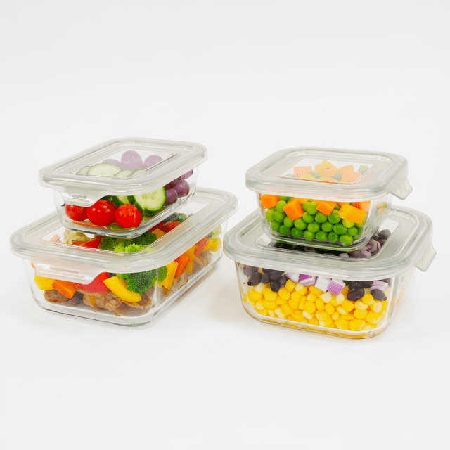 juego de 4 contenedores topper de vidrio styrka Set de 4 contenedores de vidrio STYRKA apilables, vista frontal con cuatro recipientes transparentes (1050 ml, 800 ml, 370 ml, 320 ml), tapas plásticas translúcidas con cierre perimetral, muestran verduras, granos y frutas; diseñados para refrigerador y organización de cocina; también son adecuados para guardar snacks en viajes cortos.